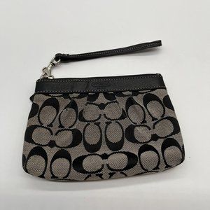 38. Coach Black Signature Canvas and Leather Wristlet
